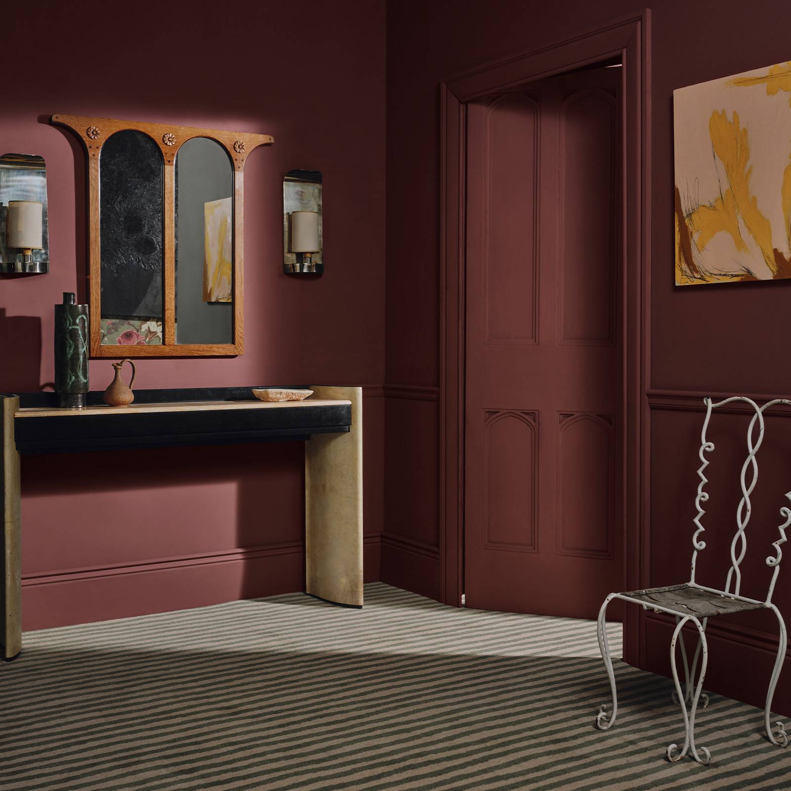 a room with a mirror and a table