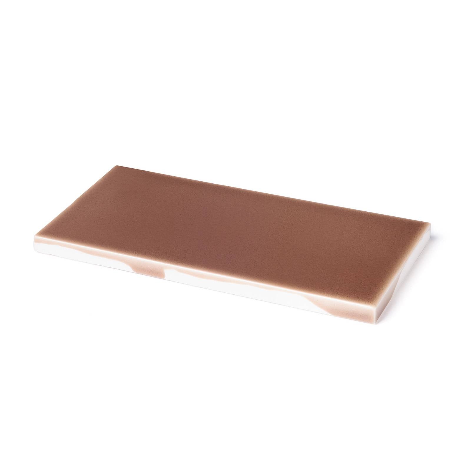 a rectangular object with a white surface