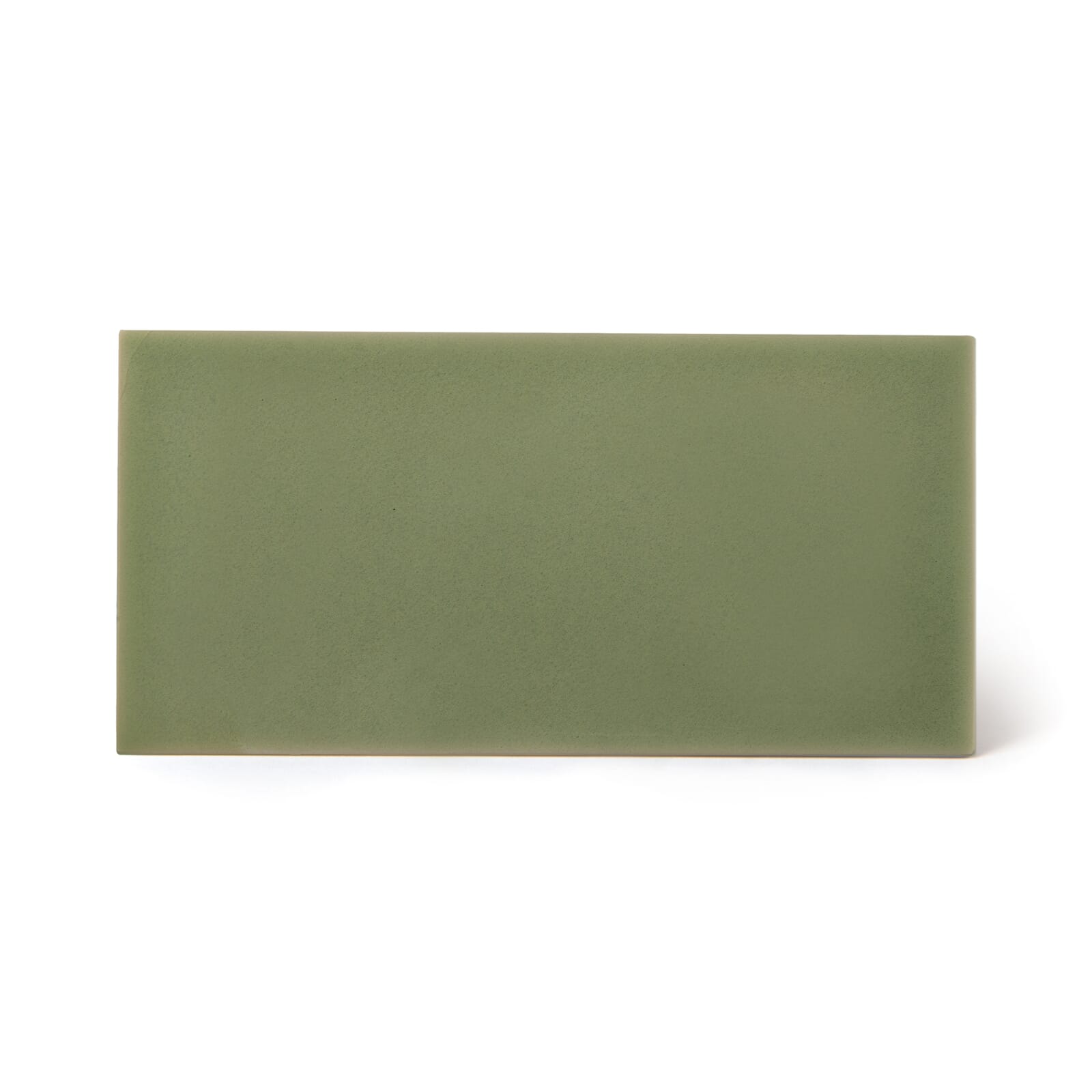 a green rectangular object on a white background