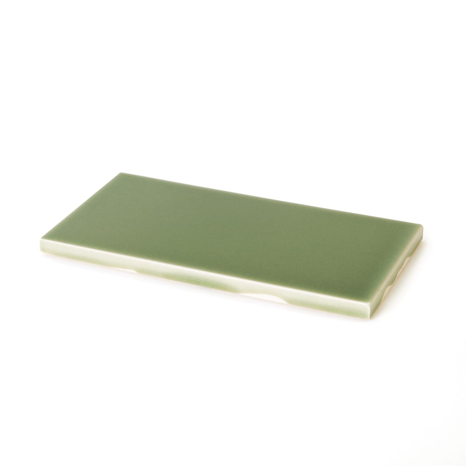 a green rectangular object on a white background